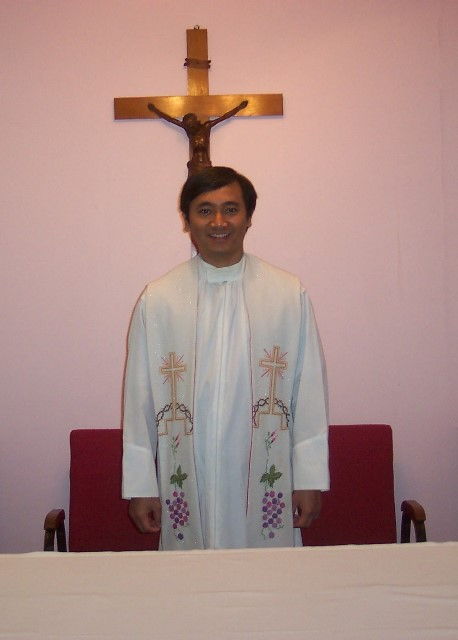 This is a photograph of Father Peter in the chapel of Saint Wenceslaus Parish in Saint Louis, Missouri.